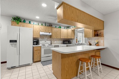 This end unit Augusta model is located in the 55+ community of on On Top of the World Golf Course in Florida - for sale on GolfHomes.com, golf home, golf lot