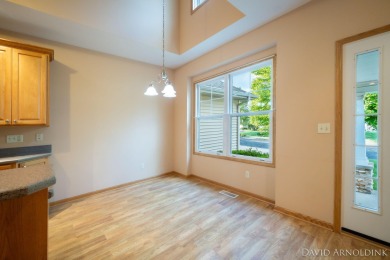 Beautiful end unit condo in The Links of Rolling Meadows! on The Links At Rolling Meadows in Michigan - for sale on GolfHomes.com, golf home, golf lot