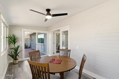 Completely remodeled home with beautiful new LVP flooring on Sunland Village Golf Club in Arizona - for sale on GolfHomes.com, golf home, golf lot