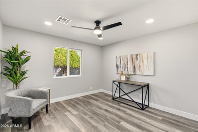 Completely remodeled home with beautiful new LVP flooring on Sunland Village Golf Club in Arizona - for sale on GolfHomes.com, golf home, golf lot