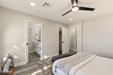 Completely remodeled home with beautiful new LVP flooring on Sunland Village Golf Club in Arizona - for sale on GolfHomes.com, golf home, golf lot