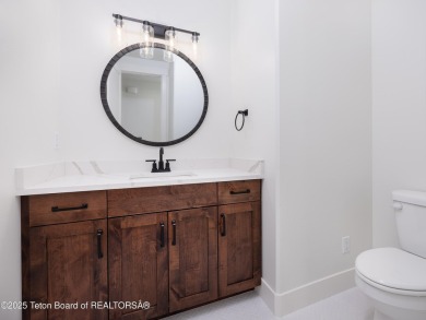 This new construction home nestled on a Teton Reserve corner lot on Teton Reserve in Idaho - for sale on GolfHomes.com, golf home, golf lot