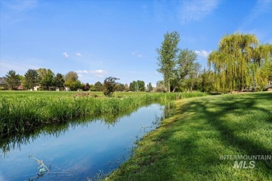 Nestled on a beautiful half-acre lot, overlooking the 11th hole on BanBury Golf Club in Idaho - for sale on GolfHomes.com, golf home, golf lot