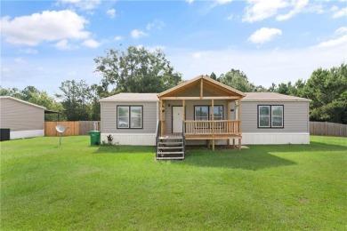 Perfectly positioned on a private, .62-acre lot, this on Sapelo Hammock Golf Club in Georgia - for sale on GolfHomes.com, golf home, golf lot