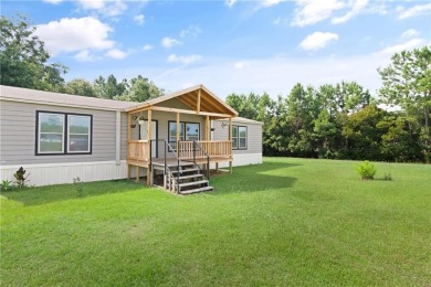 Perfectly positioned on a private, .62-acre lot, this on Sapelo Hammock Golf Club in Georgia - for sale on GolfHomes.com, golf home, golf lot