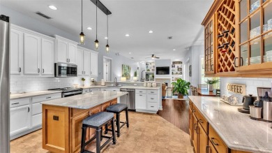Life in Eaglebrook feels easy here. This 4-bedroom, 3-bathroom on The Club at Eaglebrooke in Florida - for sale on GolfHomes.com, golf home, golf lot