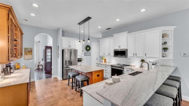 Life in Eaglebrook feels easy here. This 4-bedroom, 3-bathroom on The Club at Eaglebrooke in Florida - for sale on GolfHomes.com, golf home, golf lot