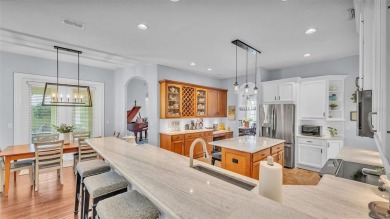 Life in Eaglebrook feels easy here. This 4-bedroom, 3-bathroom on The Club at Eaglebrooke in Florida - for sale on GolfHomes.com, golf home, golf lot