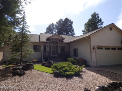 This immaculate home in the Show Low Golf & Country Club Estates on Bison Golf and Country Club in Arizona - for sale on GolfHomes.com, golf home, golf lot