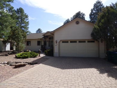 This immaculate home in the Show Low Golf & Country Club Estates on Bison Golf and Country Club in Arizona - for sale on GolfHomes.com, golf home, golf lot
