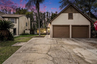 Discover the perfect blend of modern updates and serene on Northdale Golf and Tennis Club in Florida - for sale on GolfHomes.com, golf home, golf lot