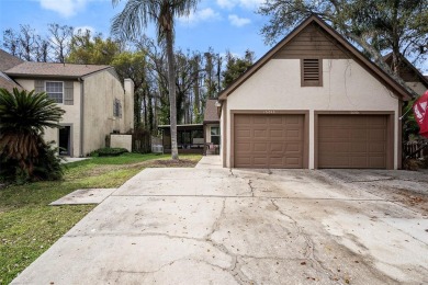 Discover the perfect blend of modern updates and serene on Northdale Golf and Tennis Club in Florida - for sale on GolfHomes.com, golf home, golf lot