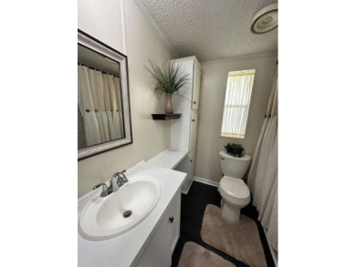 PRICE REDUCED TO $89,900! Welcome to this charming two bed, two on Four Lakes Golf Club in Florida - for sale on GolfHomes.com, golf home, golf lot