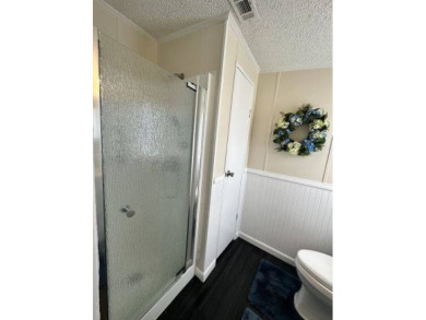 PRICE REDUCED TO $89,900! Welcome to this charming two bed, two on Four Lakes Golf Club in Florida - for sale on GolfHomes.com, golf home, golf lot