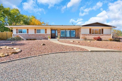 Welcome to your new home in the Redlands, just minutes from the on Tiara Rado Golf Course in Colorado - for sale on GolfHomes.com, golf home, golf lot