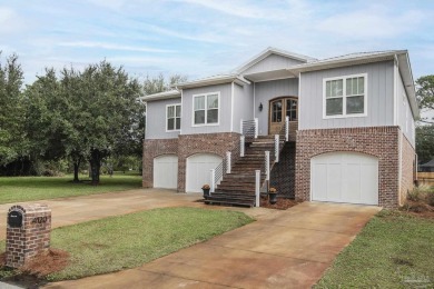 Welcome to your dream home nestled within Tiger Point! This on Tiger Point Golf and Country Club in Florida - for sale on GolfHomes.com, golf home, golf lot