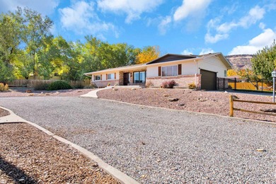 Welcome to your new home in the Redlands, just minutes from the on Tiara Rado Golf Course in Colorado - for sale on GolfHomes.com, golf home, golf lot