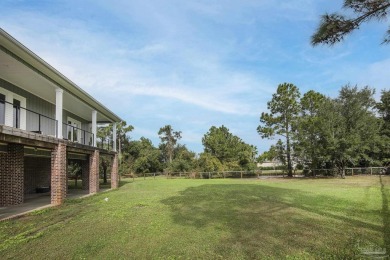 Welcome to your dream home nestled within Tiger Point! This on Tiger Point Golf and Country Club in Florida - for sale on GolfHomes.com, golf home, golf lot