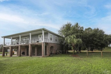 Welcome to your dream home nestled within Tiger Point! This on Tiger Point Golf and Country Club in Florida - for sale on GolfHomes.com, golf home, golf lot