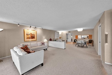 RARE CORNER KING MODEL IN PALM AIRE WITH GOLF VIEWS FROM EVERY on Palm-Aire Country Club and Resort - The Oaks in Florida - for sale on GolfHomes.com, golf home, golf lot