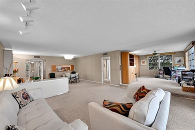 RARE CORNER KING MODEL IN PALM AIRE WITH GOLF VIEWS FROM EVERY on Palm-Aire Country Club and Resort - The Oaks in Florida - for sale on GolfHomes.com, golf home, golf lot