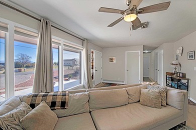 Welcome to your new home in the Redlands, just minutes from the on Tiara Rado Golf Course in Colorado - for sale on GolfHomes.com, golf home, golf lot