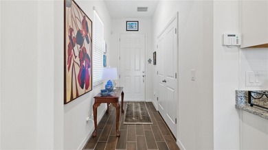 This is a SANDPIPER VILLA featuring large open concept kitchen on Mystic Dunes Resort and Golf Club in Florida - for sale on GolfHomes.com, golf home, golf lot