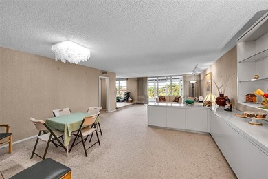 RARE CORNER KING MODEL IN PALM AIRE WITH GOLF VIEWS FROM EVERY on Palm-Aire Country Club and Resort - The Oaks in Florida - for sale on GolfHomes.com, golf home, golf lot