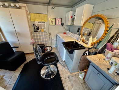 Home is located in Water Oak Country Club Estates in Lady Lake on Water Oak Country Club Estates in Florida - for sale on GolfHomes.com, golf home, golf lot