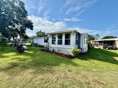 Home is located in Water Oak Country Club Estates in Lady Lake on Water Oak Country Club Estates in Florida - for sale on GolfHomes.com, golf home, golf lot