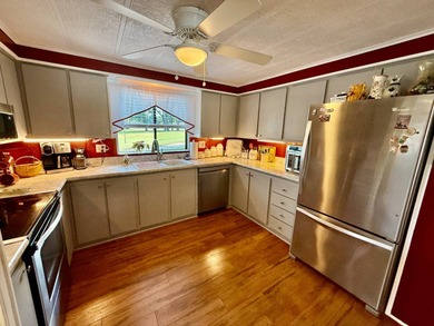 Home is located in Water Oak Country Club Estates in Lady Lake on Water Oak Country Club Estates in Florida - for sale on GolfHomes.com, golf home, golf lot