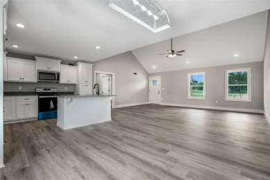 This beautiful home offers a relaxed and stylish lifestyle in a on Russellville Country Club in Kentucky - for sale on GolfHomes.com, golf home, golf lot
