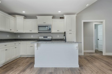 This beautiful home offers a relaxed and stylish lifestyle in a on Russellville Country Club in Kentucky - for sale on GolfHomes.com, golf home, golf lot