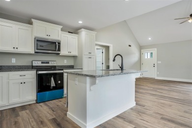 This beautiful home offers a relaxed and stylish lifestyle in a on Russellville Country Club in Kentucky - for sale on GolfHomes.com, golf home, golf lot