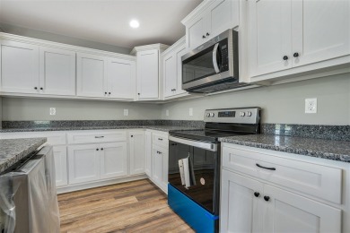 This beautiful home offers a relaxed and stylish lifestyle in a on Russellville Country Club in Kentucky - for sale on GolfHomes.com, golf home, golf lot
