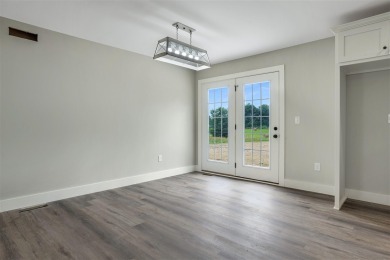 This beautiful home offers a relaxed and stylish lifestyle in a on Russellville Country Club in Kentucky - for sale on GolfHomes.com, golf home, golf lot