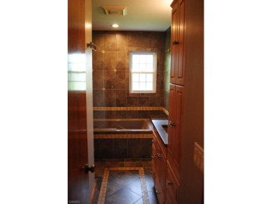 Visit this immaculately maintained home. Freshly painted on Green Knoll Golf Course in New Jersey - for sale on GolfHomes.com, golf home, golf lot