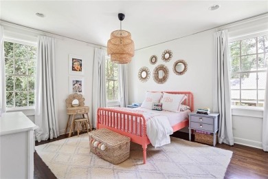 Beautifully updated and full of charm, this home is nestled in on Bobby Jones Golf Club in Georgia - for sale on GolfHomes.com, golf home, golf lot
