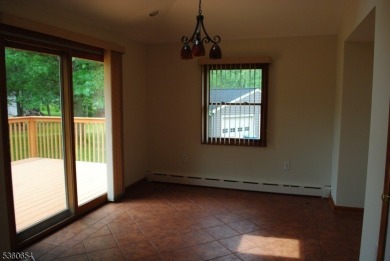 Visit this immaculately maintained home. Freshly painted on Green Knoll Golf Course in New Jersey - for sale on GolfHomes.com, golf home, golf lot