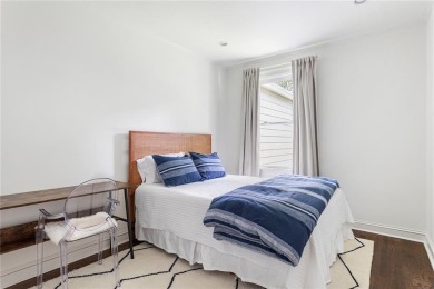 Beautifully updated and full of charm, this home is nestled in on Bobby Jones Golf Club in Georgia - for sale on GolfHomes.com, golf home, golf lot