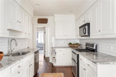 Beautifully updated and full of charm, this home is nestled in on Bobby Jones Golf Club in Georgia - for sale on GolfHomes.com, golf home, golf lot