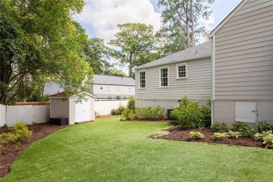 Beautifully updated and full of charm, this home is nestled in on Bobby Jones Golf Club in Georgia - for sale on GolfHomes.com, golf home, golf lot