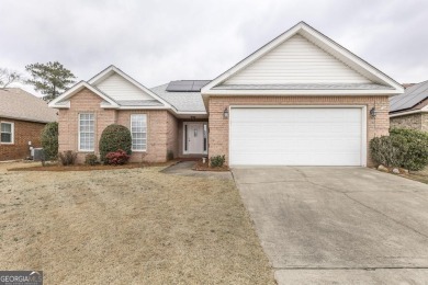 Step out your back door and play a round of golf as this 2BR/2BA on The International City Golf Course in Georgia - for sale on GolfHomes.com, golf home, golf lot