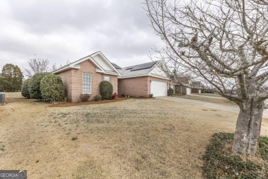 Step out your back door and play a round of golf as this 2BR/2BA on The International City Golf Course in Georgia - for sale on GolfHomes.com, golf home, golf lot