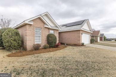 Step out your back door and play a round of golf as this 2BR/2BA on The International City Golf Course in Georgia - for sale on GolfHomes.com, golf home, golf lot