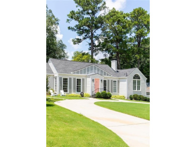 Beautifully updated and full of charm, this home is nestled in on Bobby Jones Golf Club in Georgia - for sale on GolfHomes.com, golf home, golf lot