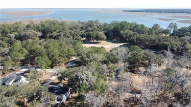 UPGRADES JUST ADDED! Brick skirting has been installed around on Sapelo Hammock Golf Club in Georgia - for sale on GolfHomes.com, golf home, golf lot