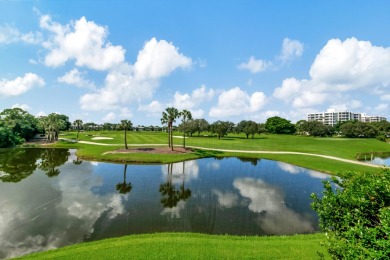 Charter Cay 2nd floor club villa with magnificent water and golf on Boca West Golf and Country Club in Florida - for sale on GolfHomes.com, golf home, golf lot