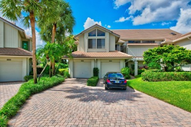 Charter Cay 2nd floor club villa with magnificent water and golf on Boca West Golf and Country Club in Florida - for sale on GolfHomes.com, golf home, golf lot