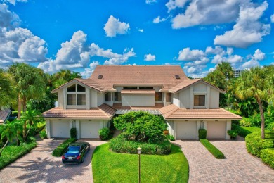 Charter Cay 2nd floor club villa with magnificent water and golf on Boca West Golf and Country Club in Florida - for sale on GolfHomes.com, golf home, golf lot